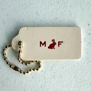Coach White MF Initials Red Rabbit Hangtag